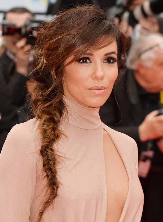 Messy wispy side fishtail braid with layered side bang hairstyle