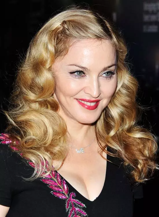 Pinned-up vintage blonde curls hairstyle for women over 50