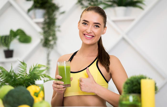 Woman drinking a Herbalife smoothie for weight loss