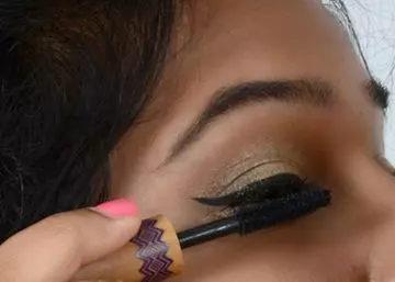 Step 8 of gold eye makeup