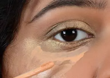 Step 5 of gold eye makeup