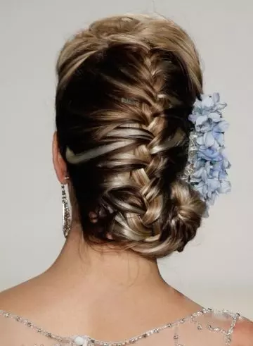 Tucked in braided bun edgy hairstyle for long hair