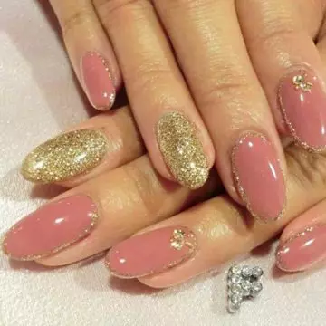 Pink and gold 3D nail art design