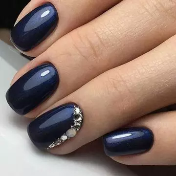 Dark blue jewel studded 3D nail art design