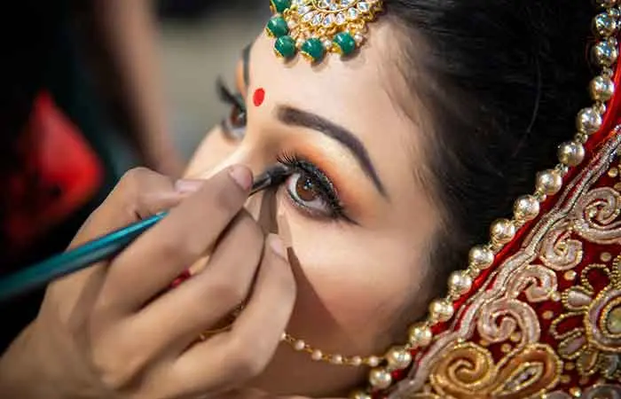 A bride getting her makeup done