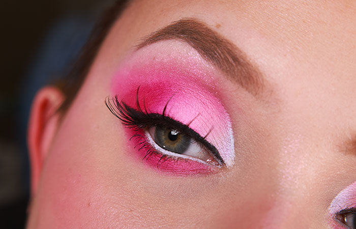 Close up of pink and white flamingo eye makeup