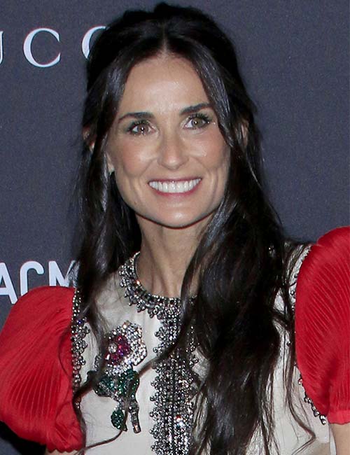 Demi Moore's loose half ponytail hairstyle