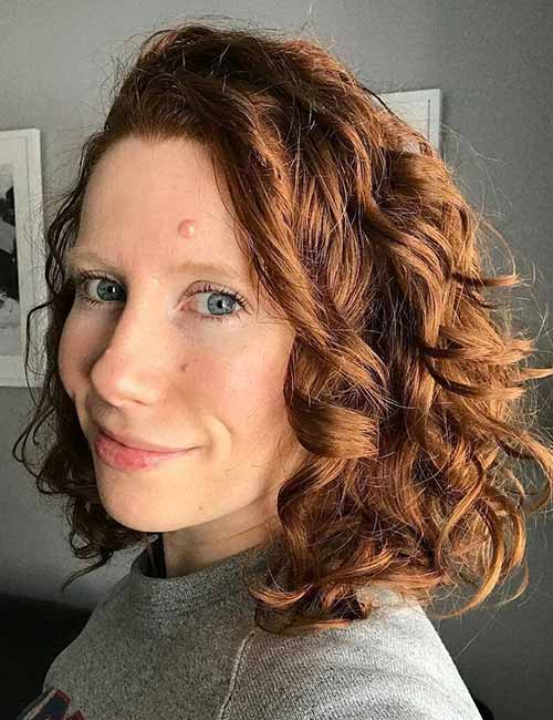 Short ginger curls hairstyle