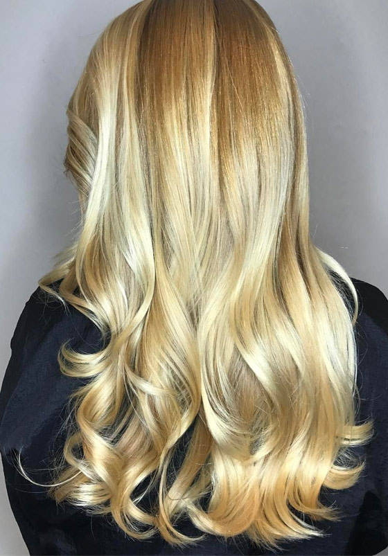 Golden blonde hair color for warm-toned pale skin