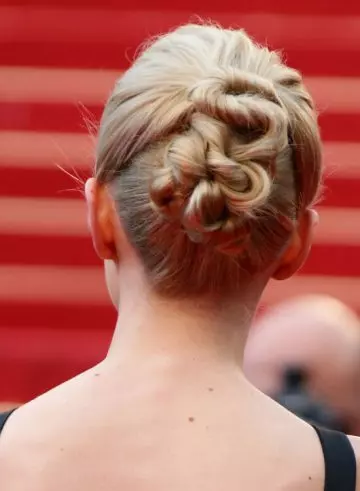 Medium base knotted bun hairstyle for triangle face shape