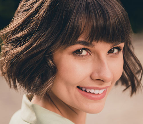Short bangs and curls hairstyle