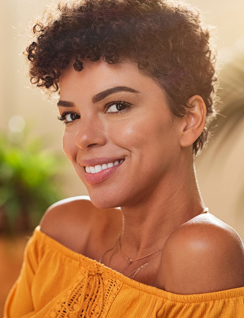 Short dominican curls hairstyle