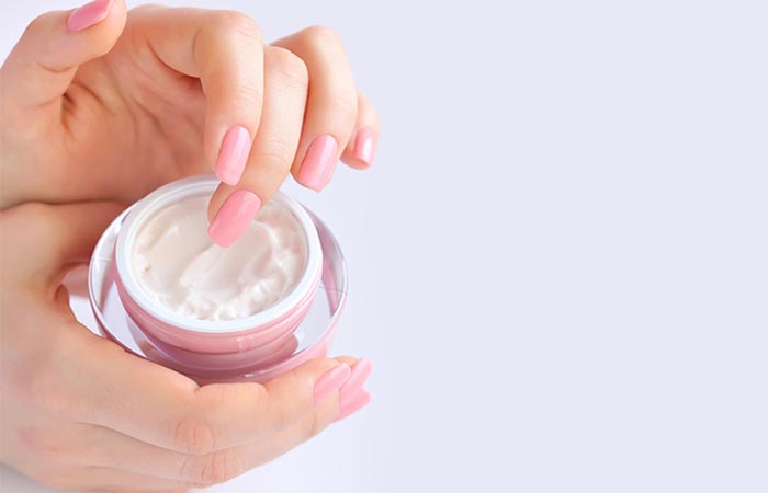 Apply a hand moisturizer as part of a manicure at home
