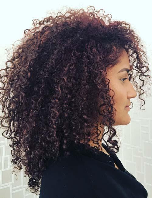 layered cut hairstyle for curly hair