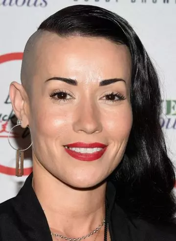 Slicked side waves with shaved one side punk wavy hairstyle