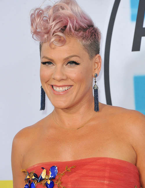 Soft Pink Textured Curls With Shaved Sides