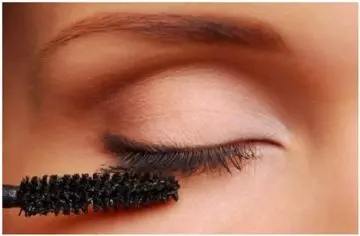 Use make-up remover to fix clumpy lashes