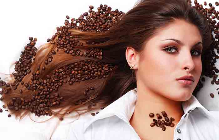 Woman lying with coffee beans around her hair