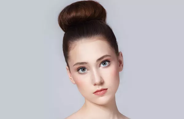 High bun formal hairstyle for long hair