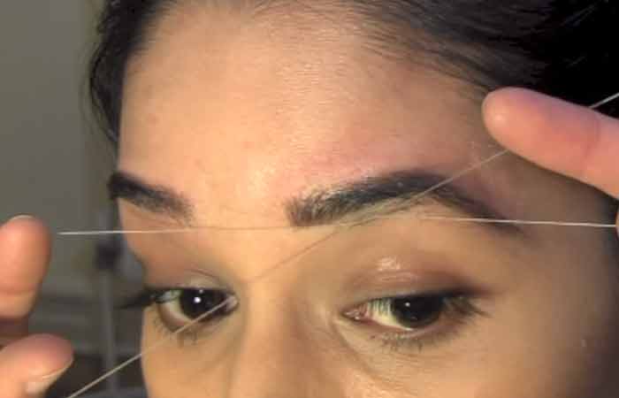 Step 9 to thread eyebrows at home