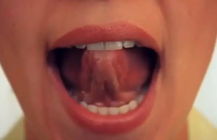 Tongue-press for reducing double chin