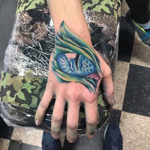 eyeball with spikes on hand by Toxyc : TattooNOW
