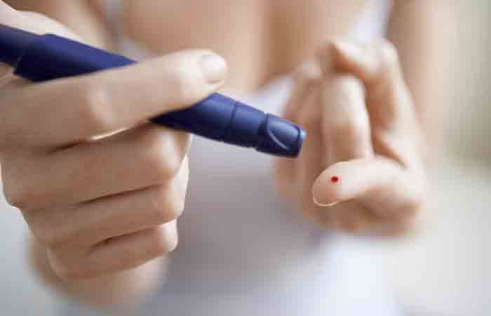 Person with diabetes checking blood sugar level