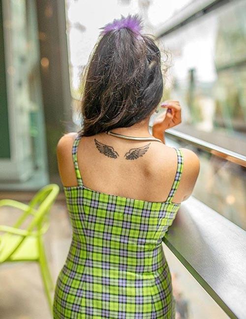 simple wing tattoo designs for girls on back