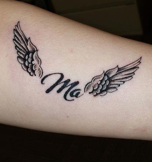 Angel wings tattoo design on the forearm