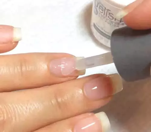 Apply a thin coat of gel nail polish to get the perfect gel French manicure