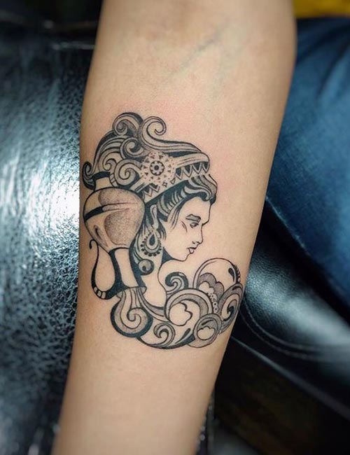 Aquarius tattoo represented by a water-bearing female figure
