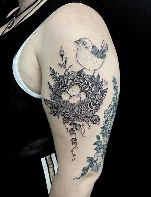 Bird's nest arm tattoo idea