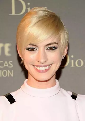 Bleached blonde pixie short hairstyle for women