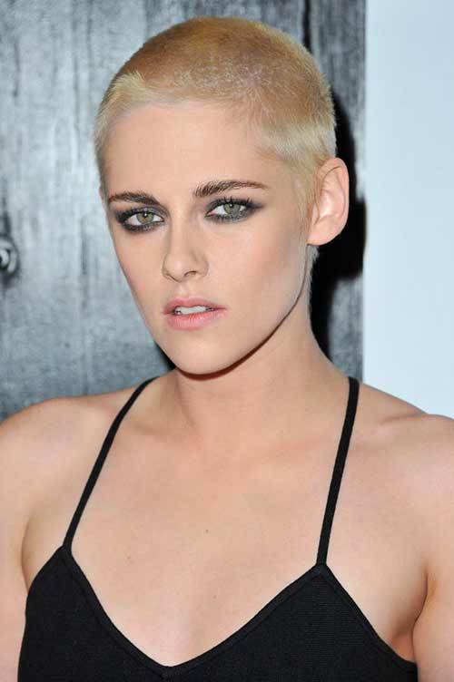Bleached blonde short crop hairstyle for women