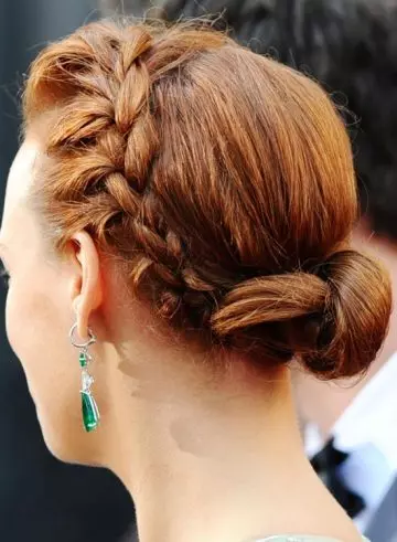 Braided chignon as bridal hairstyle for curly hair
