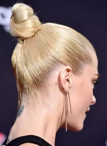 Sleek and sexy high knotted bun hairstyle for long hair
