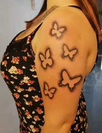 Butteflies and dragonflies arm tattoo idea