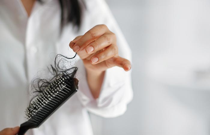 Woman losing hair as a result of GM diet