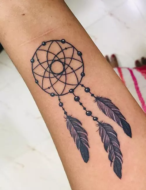 Dreamcatcher arm tattoo idea