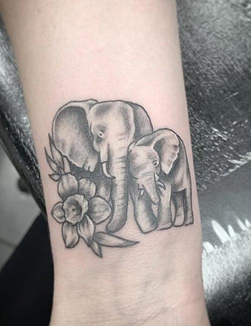 Elephant arm tattoo idea