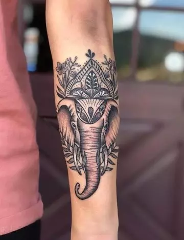 Elephant face tattoo
