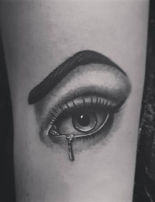 Sad girls dont cry Crying eyes tattoo on little heart frame done for Jade  with love at sashatattooingla LOS ANGELES  BOOKING OPEN  Instagram