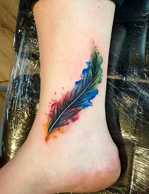 A colorful feather tattoo