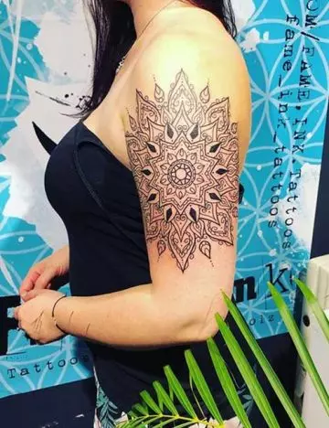 Mandala arm tattoo idea