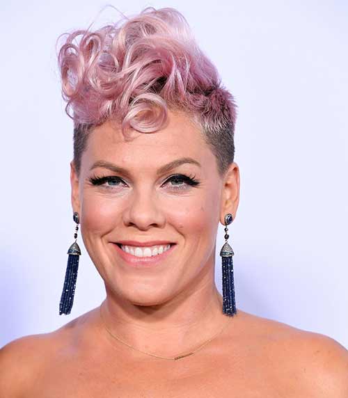 Messy curled Mohawk short hairstyle for women