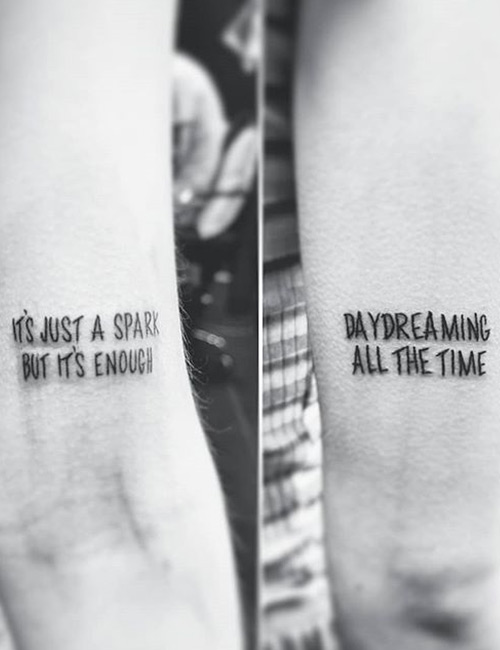 Positive quotes tattoo on the arms