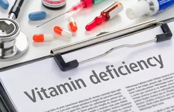 Vitamin deficiency' written on clipboard