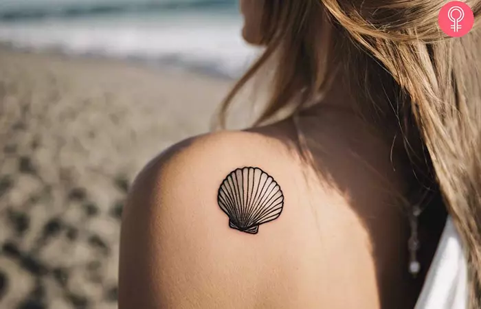 Seashell tattoo on the shoulder