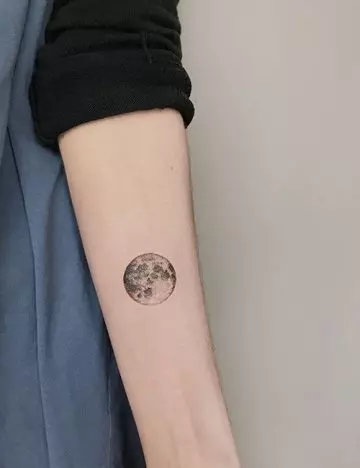 Simple moon tattoo design for women