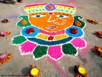 Unique rangoli design with a goddess's face